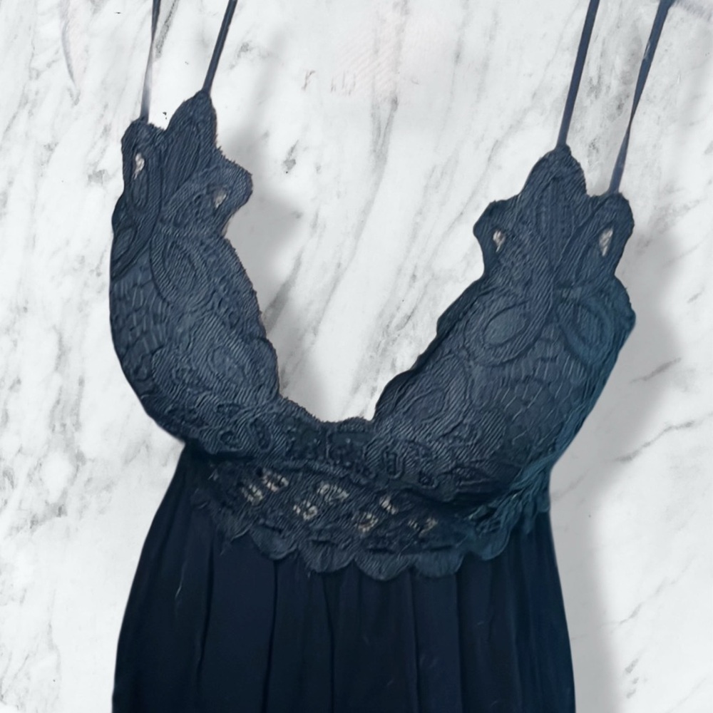 Black Lace Strappy Mini Dress with Asymmetrical Hem - Picture 5 of 16